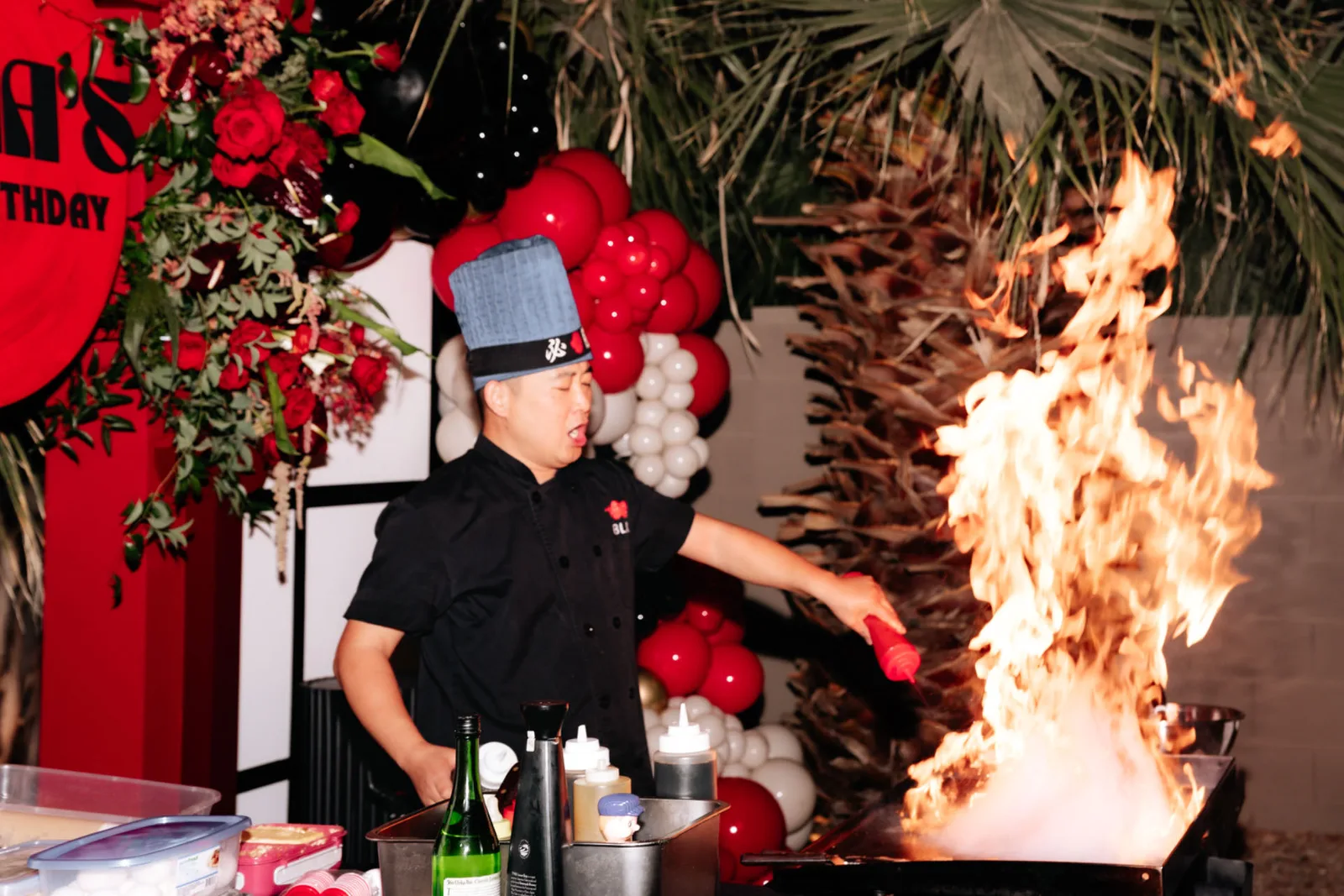 Hibachi Blu chef performing with flames at a private Arizona event